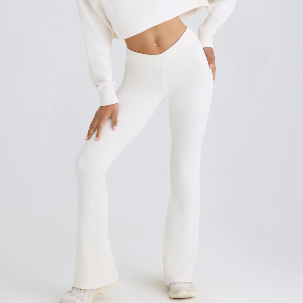 Bo + Tee Oh Polly Athleisure Textured Cotton Jersey Flared Leggings in White